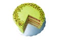 Cake with fruity cream and pistachio decorated with nuts, isolated