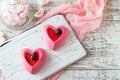 Cake hearts on white rustic board Royalty Free Stock Photo