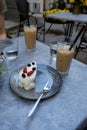 Cake and iced coffe in a cafe on a nice summer day Royalty Free Stock Photo