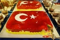 Cake with icing painted Turkish flag, restaurant food concept in the hotel Royalty Free Stock Photo