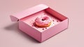 a cake in innovative packaging, showcased inside a robust pink box, captured from an overhead perspective with a white