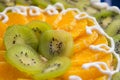 Cake with kiwi and orange slices Royalty Free Stock Photo