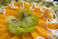 Cake with kiwi and orange slices Royalty Free Stock Photo