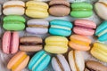 Cake macaron or macaroon on gray background. Colorful almond cookies, bright colors. Top view