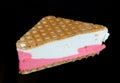 Cake made of triangular waffles and creamy pink ice cream isolated on black Royalty Free Stock Photo