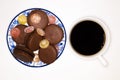 Cake makaroni on a plate with cup of coffee Royalty Free Stock Photo