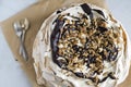 Cake meringues with with nuts and chocolate. Delicious dessert. Top view