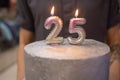 cake with a number twenty-five on top.Birthday, anniversary. Royalty Free Stock Photo