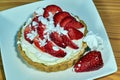 Cake  with whipped cream and strawberries Royalty Free Stock Photo