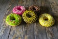 Cake pink green yellow set delivery chocolate wood round Royalty Free Stock Photo