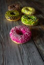 Cake pink green yellow set delivery chocolate wood round Royalty Free Stock Photo