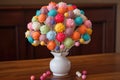 cake pop bouquet made of brightly colored cake pops