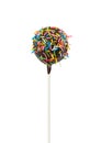 Cake pop with chocolate icing and colorful sprinkles Royalty Free Stock Photo