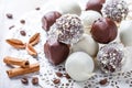 Cake pops decorated with white, dark chocolate and coconut on napkin, natural light Royalty Free Stock Photo