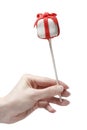 Cake pops in gift shape in beautiful hand