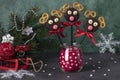 Cake pops Santa reindeers made from cookies in chocolate and crackers on green, Idea Christmas treats for childrens Royalty Free Stock Photo