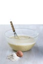 Cake preparation ingredient,Flour with eggs and butter ,wire whisk