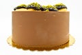 Cake with profiterol and chocolate pistachio