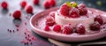 Cake With Raspberries on Pink Plate