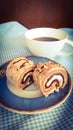 Cake roll with cup of coffee Royalty Free Stock Photo