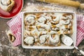 Cake server sitting in cinnamon roll baking dish Royalty Free Stock Photo