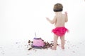 Cake smash shoot: Oh dear! Baby girl and big messy Royalty Free Stock Photo