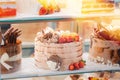 cake with strawberries, yummy assortment baked pastry in bakery. Various Different Types Of Sweet Cakes In Pastry Shop