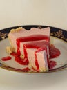 Cake with strawberry sauce Royalty Free Stock Photo