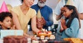 Cake, surprise and family at birthday party celebration together at modern house with candles and cake. Smile, excited Royalty Free Stock Photo