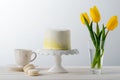 Cake, tea cup and tulips Royalty Free Stock Photo