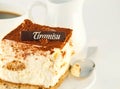 Cake tiramisu and a cup of coffee Royalty Free Stock Photo