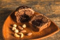 Cake on wooden bowl.