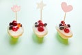 mini cakes with berries and cottage. party decoration with hearts. Valentine& x27;s Day gift for holiday