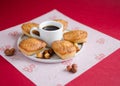 Cakes with caramelized sugar and shredded almond on red background Royalty Free Stock Photo