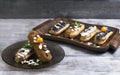 Cakes eclairs, mint, berries Physalis