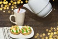 Cakes in the form of a basket with mushrooms and tea poured into a Cup. Selective focus Royalty Free Stock Photo