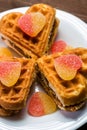 Cakes in the form of hearts are on a white plate. Royalty Free Stock Photo