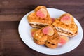 Cakes in the form of hearts are on a white plate. Royalty Free Stock Photo