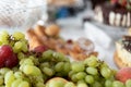 Cakes and fruit on the table. Party food. The table is prepared for a holiday party for guests Royalty Free Stock Photo