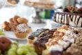 Cakes and fruit on the table. Party food. The table is prepared for a holiday party for guests Royalty Free Stock Photo