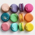 Cakes macaron or macaroon on light background, colorful vibrant almond cookies, brightl colors