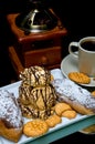 cakes, pastries and a cup of coffee on a black background closeup Royalty Free Stock Photo