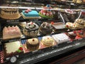 Cakes on the shelves of supermarket.