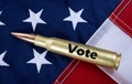 50 Cal Bullet with Vote on it. Royalty Free Stock Photo