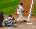 Cal Ripken makes contact on a pitch.