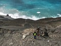 Active mud creek landslide - rockfall mitigation crew taking measurements Royalty Free Stock Photo