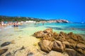 Cala Cipolla, Chia beach with red stones and azure clear water.