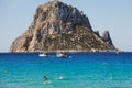 Cala Hort beach with sea sailing yachts in Ibiza island Royalty Free Stock Photo