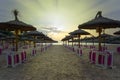 cala marsal beach, beaches of mallorca, spain, with rows of umbrellas and hammocks, ready for tourists,vacation tourism Royalty Free Stock Photo