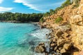 Cala Salada and Saladeta in san Antonio Abad at Balearic Islands Spain. Typical house for fishing boats and rocks. Royalty Free Stock Photo